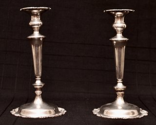 Sterling Silver Scrolled Candlesticks With Elongated Tapered Columns. 26.8 Ozt