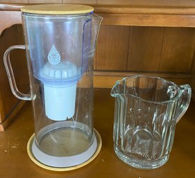 Two Water Pitchers