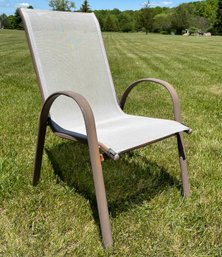 An Outdoor Metal And Mesh Chair