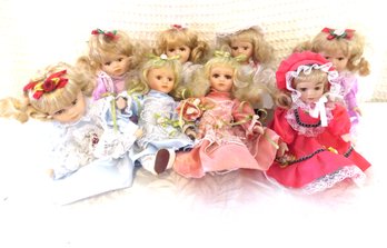 8 Sitting Porcelain Dolls