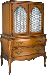 A Vintage Chest Of Drawers With Paneled Doors By Dixon Powdermaker