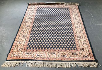 A Machine Made Wool Rug In Indo-Persian Style