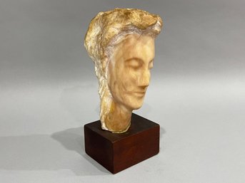 Stone Head Sculpture On Wood Base