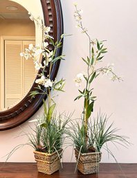 A Pair Of Silk Floral Arrangements In Planters