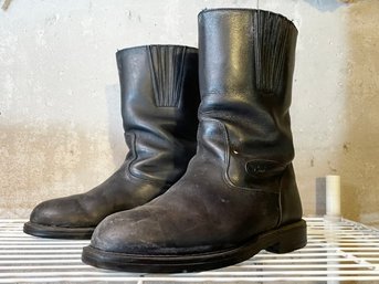 A Men's Pair Of Leather Motorcycle Boots