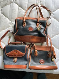 Set Of Trio Vintage Dooney & Bourke Leather Handbags.