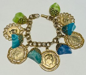 VINTAGE GOLD TONE COIN AND PLASTIC BOBBLES CHARM BRACELET