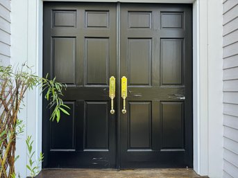 A Double Solid Wood Entrance Door With Baldwin Hardware