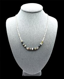 Southwestern Liquid Silver Style Necklace With Brown And Tan Color Beads