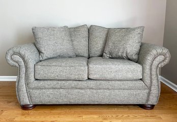 A Grey Linen Rolled Arm Loveseat By Emeraldcraft With Nailhead Trim - Like New!