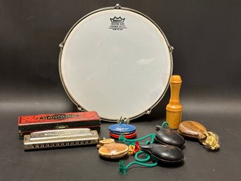 An Assortment Of Musical Instruments & Folk Art Noise Makers