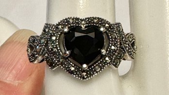 VINTAGE STERLING SILVER AND MARCASITE DARK GARNET HEART RING