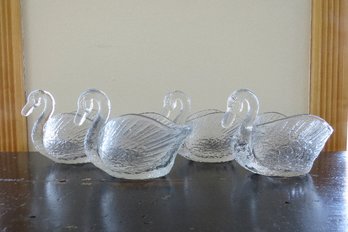 A Grouping Of 4 Glass Swans