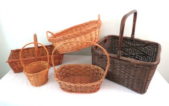 Lot Of 5 Baskets Including A Dark Brown Basket