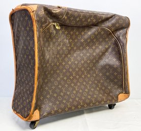 A Vintage Louis Vuitton Rolling Suitcase - AS IS