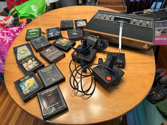 Vintage Atari Gamer With 2 Controllers And 12 Games Including Frogger, Astroids, Pitfall, And Pac Man