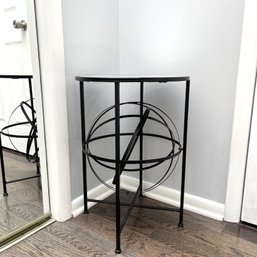 A Round Metal Occasional Table