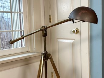 A Terrific Industrial Tripod Floor Lamp In Brass