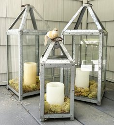 A Trio Of Rustic Candle Lanterns