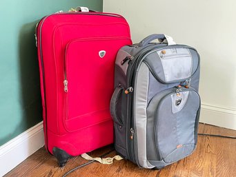 A Pair Of Rolling Suitcases