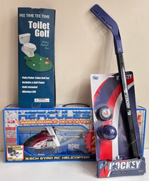 New In Box Hercules Helicopter, Toilet Golf Toy & Hockey Stick