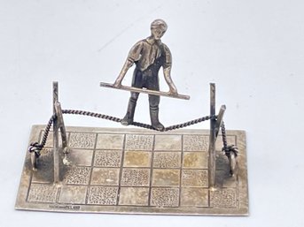 Vintage Miniature Silver Display Of A Man Balancing On A Tightrope, A Funambulist.