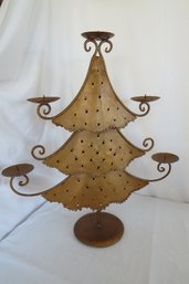 A Metal Christmas Tree Shaped Candle Holder