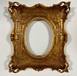 Fancy Oval Centered Gold Frame