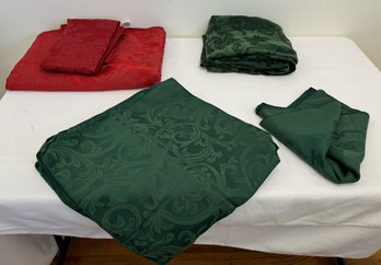 A Group Of Christmas Table Clothes Napkins By JC Penney & More