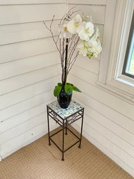 Small Metal Tile Top Table With Faux Orchid