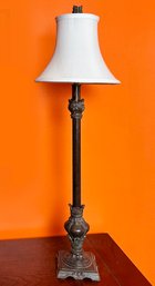 A Tall Metal Stick Lamp
