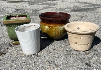 A Collection Of Smaller Planters