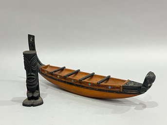 Carved Wood Boat And Coco Joe Lava Sculpture