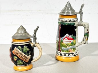 A Pair Of Vintage German Beer Steins