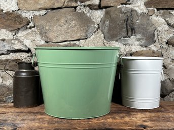 A Grouping Of Metal Containers
