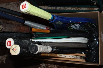 Box Of Tennis Racquets And Baseball Bats
