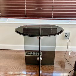 A 2-piece Smoked Glass Round Occasional Table