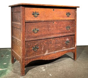 A Late 19th Century Paneled Oak Dresser
