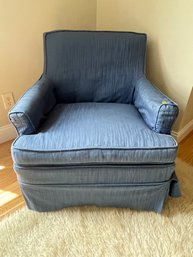 A SLIP COVERED EASY CHAIR