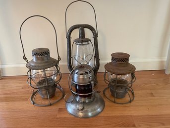 Four Antique Rail Road Lanterns .