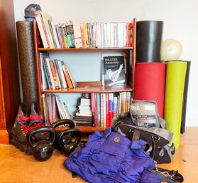 Various Workout Books, Yoga Mats, A Step And Shelf