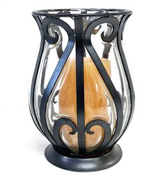 A Large Metal And Glass Candle Sconce