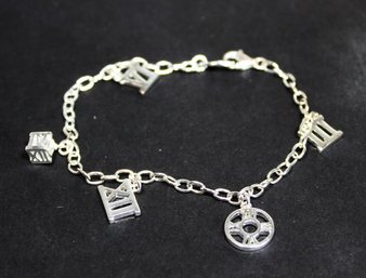 Sterling Silver Charm Bracelet Having Roman Numeral Number Charms 7 1/2'