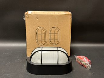 Indoor/Outdoor Light With Cage Guard, New/Unused