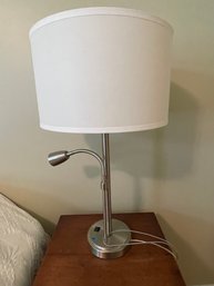 A PAIR OF CONTEMPORARY BEDSIDE LAMPS BY PACIFIC COAST LIGHTING