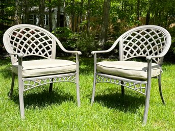 A Pair Of Cast Aluminum Outdoor Arm Chairs By Cast Classics