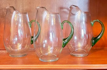 A Trio Of Large Art Glass Water Pitchers