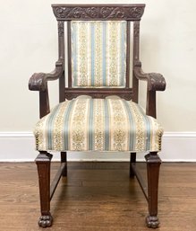 An Antique Carved Oak Arm Chair In Gothic Revival Style