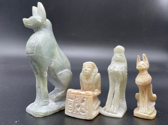 Four Vintage Carved Soap Stone Egyptian Figures .