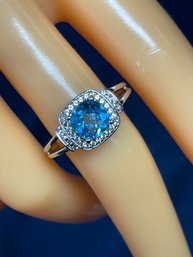 Sterling Silver And Blue Topaz Ring